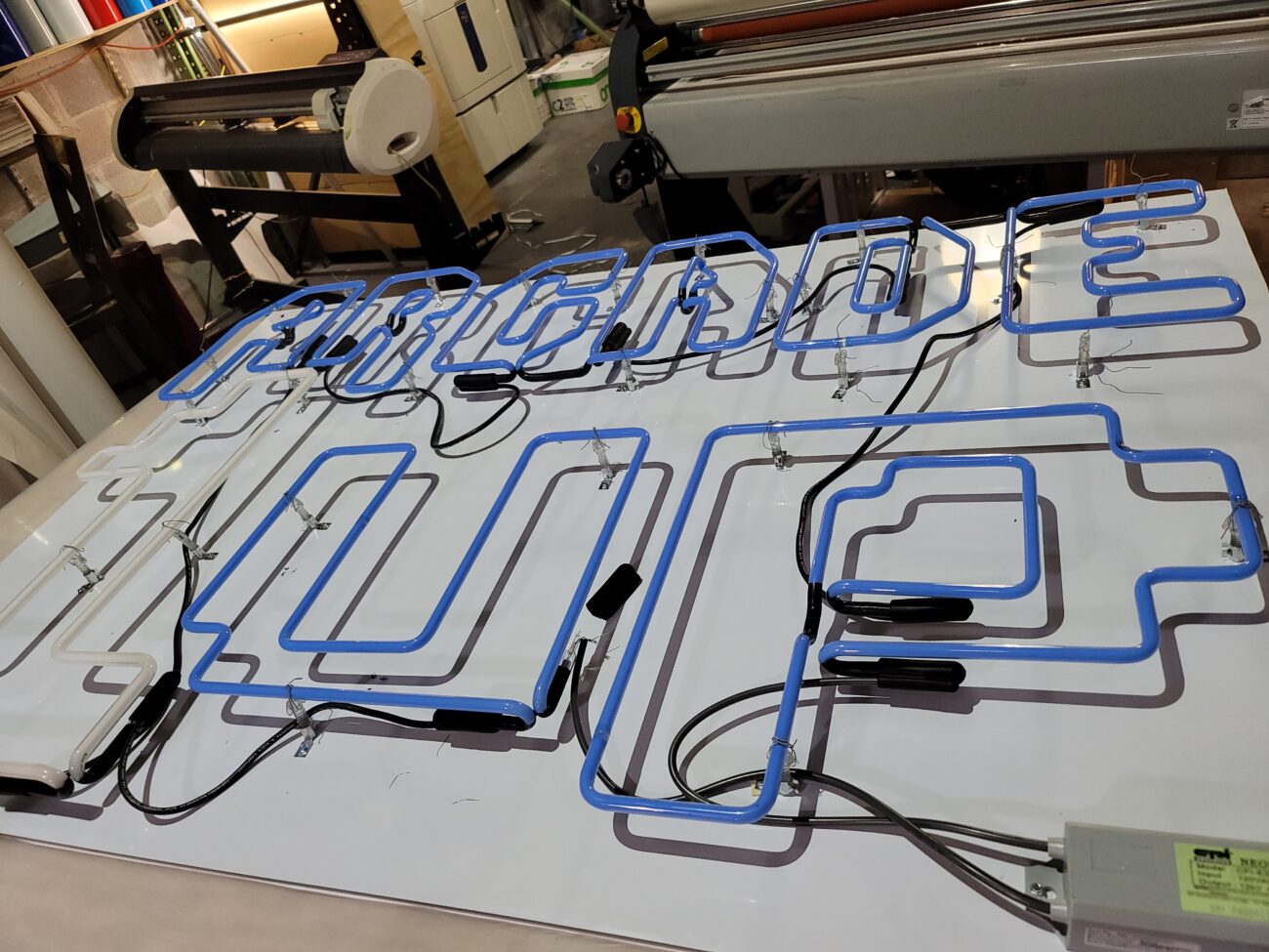 Custom glass neon sign Miami business storefront